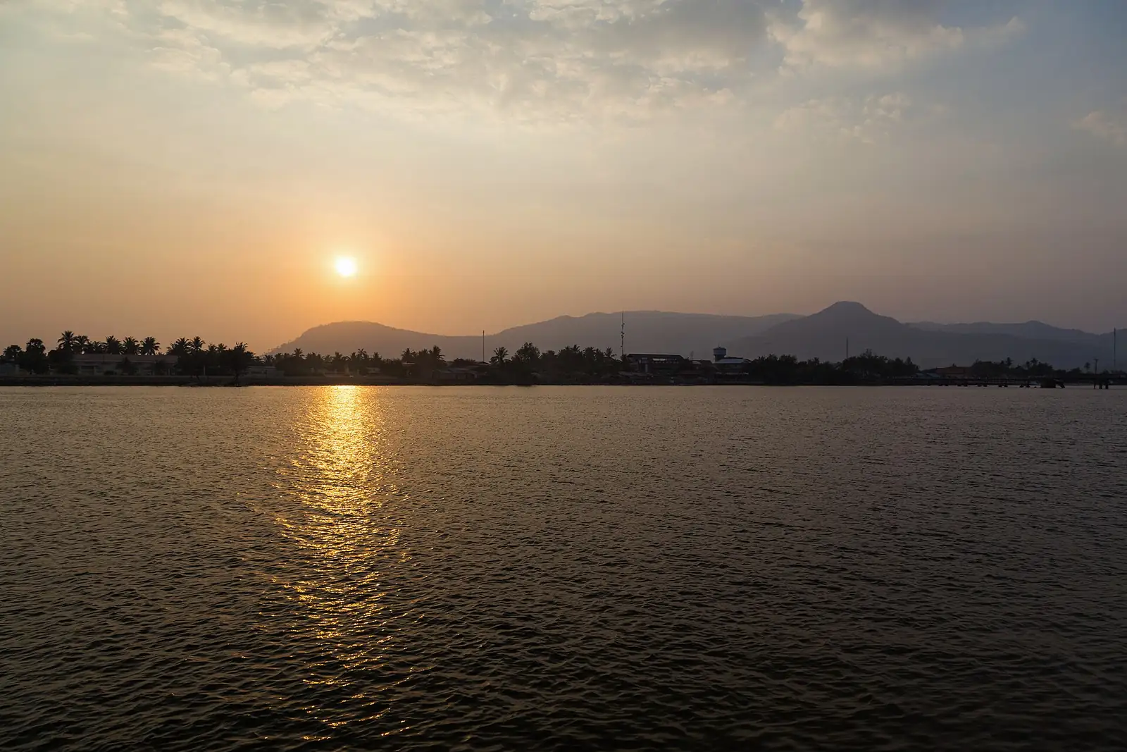 Sunset over the Praek Tuek Chhu river in Kampot
